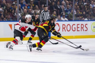 The door for Quinn Hughes to play with brothers Jack and Luke in New Jersey has been opened after comments made by Canucks President.