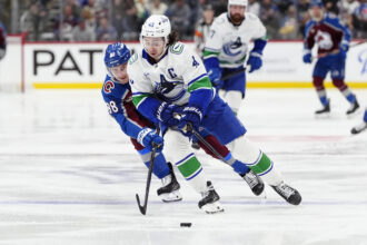 According to reports the New Jersey Devils and the Vancouver Canucks had a conversation about Quinn Hughes but there is work to be done.